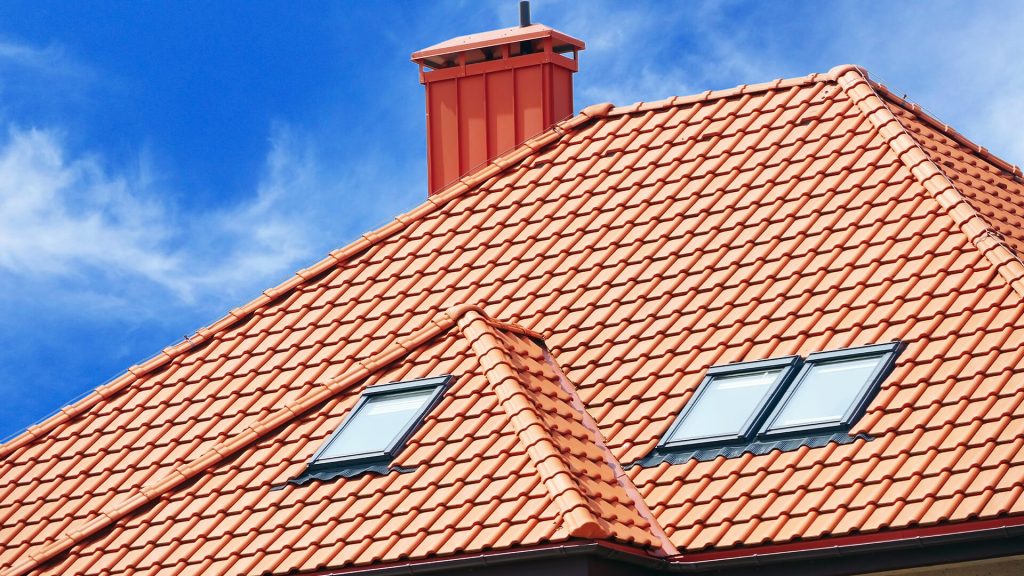 Freshly installed red tile roof on a residential home in Colorado
